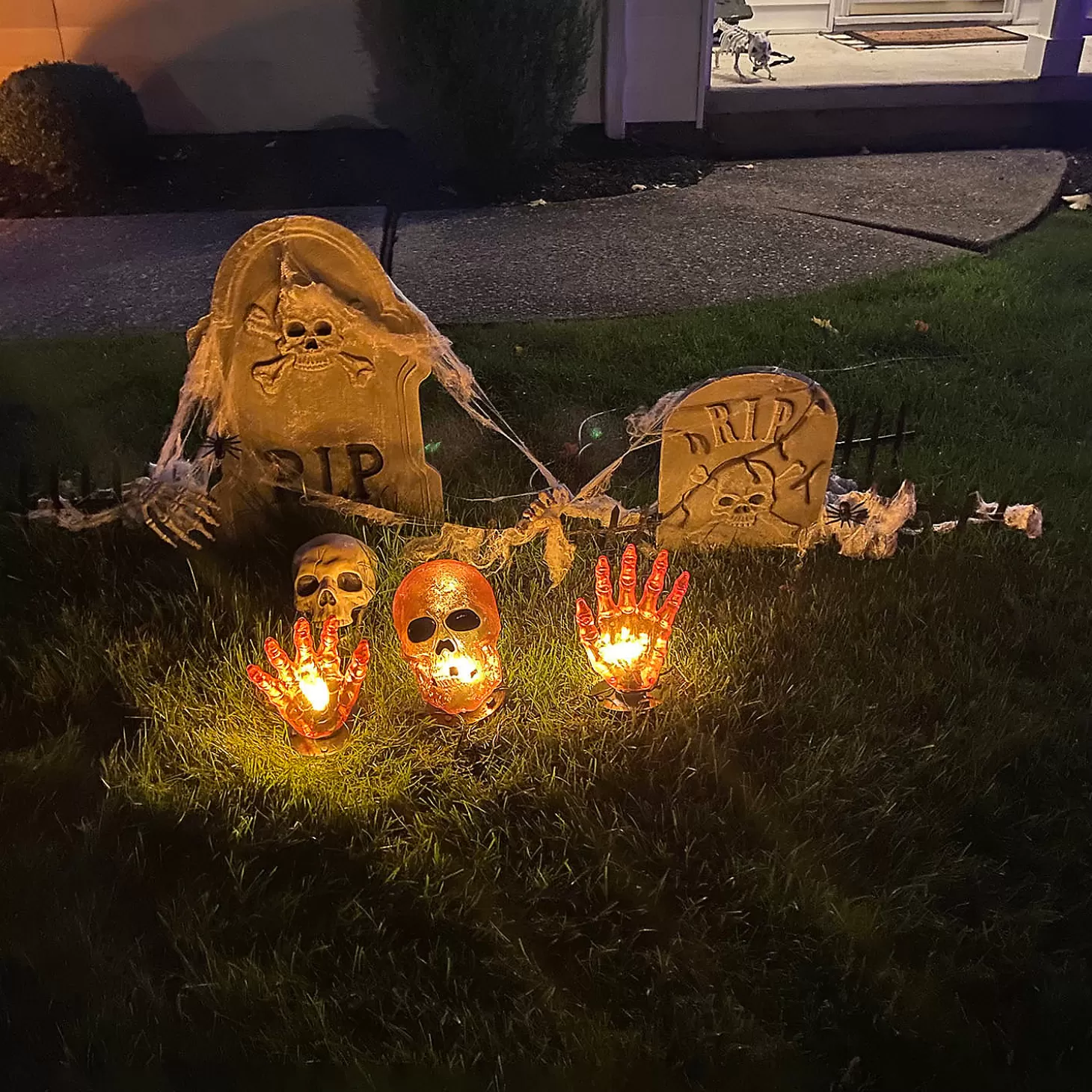 Store 8.5" Lighted Orange Skull And Hands Outdoor Halloween Decoration - 4Ft Black Wire Skulls & Skeletons